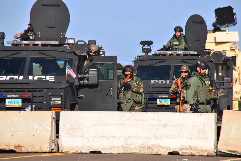 Law enforcement from four states standoff against activistts from and supporting Standing Rock - photo by C.S. Hagen