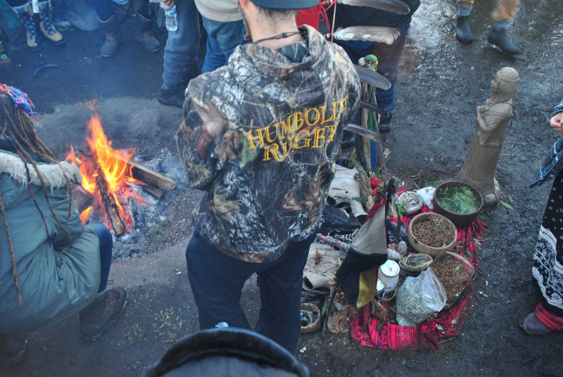 The sacred fire at Oceti Sakowin before it was extinguished - photo by C.S. Hagen